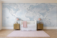 Light Blue World Map Map Mural in a nursery
