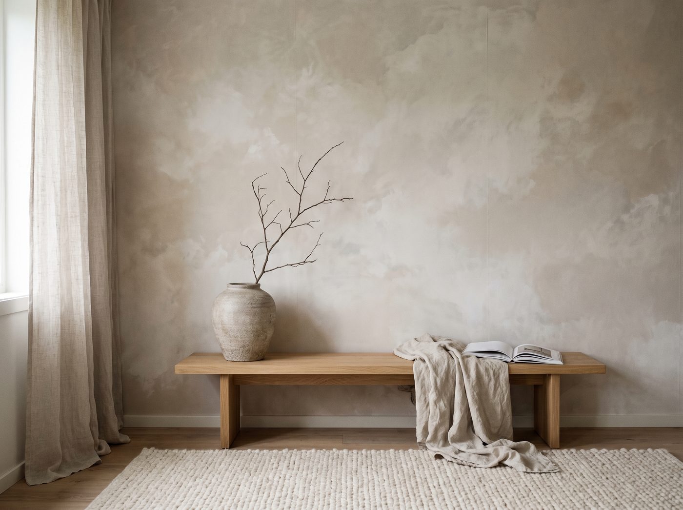 A tonal plaster effect mural in a minimalist living space
